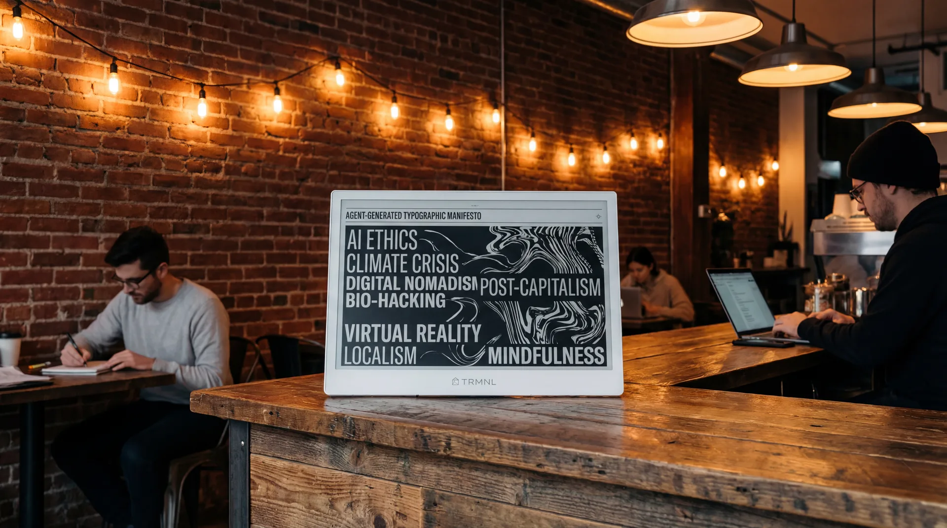 TRMNL in cafe showing generative typographic manifesto with trending topics